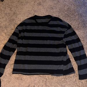 Large black and grey long sleeved shirt